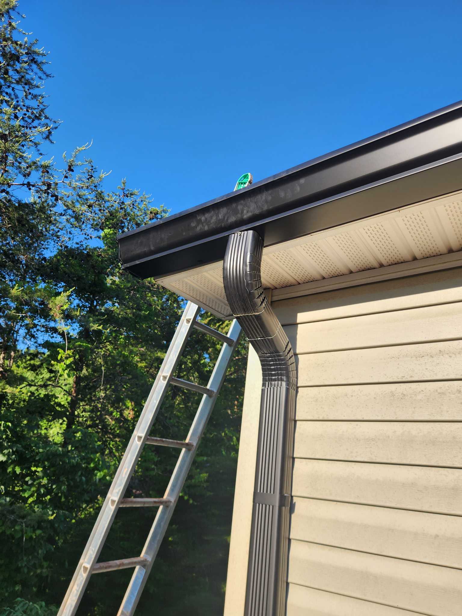 Close-up view of a newly installed gutter system ensuring proper water drainage
